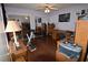 Spacious bedroom featuring hardwood floors, a ceiling fan, and ample natural light at 574 Trillum Sw Ct, Marietta, GA 30008