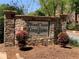 Stone entrance sign for WoodChase and Coral Ridge private home communities at 574 Trillum Sw Ct, Marietta, GA 30008