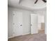 Bedroom featuring neutral carpet and access to an ensuite bathroom at 1076 Field View Dr, Mcdonough, GA 30253
