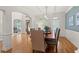 Dining room showcasing hardwood floors, natural light, and architectural details at 1315 Woodland Trce, Cumming, GA 30041