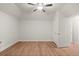 This carpet free room features a ceiling fan, recessed lighting, and is move in ready at 1315 Woodland Trce, Cumming, GA 30041