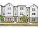 Charming townhomes with brick accents, neutral siding, and well-manicured landscaping at 1608 Falcon Crest Way # 58, Decatur, GA 30032