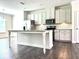 Modern kitchen featuring stainless steel appliances, granite countertops and an island at 1608 Falcon Crest Way # 58, Decatur, GA 30032