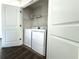 Laundry closet with stacked washer and dryer units at 1608 Falcon Crest Way # 58, Decatur, GA 30032