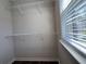 Walk-in closet with shelves, and a window for natural light at 1608 Falcon Crest Way # 58, Decatur, GA 30032