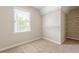 Bedroom featuring a window for natural light and wire shelving at 1611 Threepine Pl, Lilburn, GA 30047