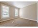 Neutral bedroom with two large windows at 1611 Threepine Pl, Lilburn, GA 30047