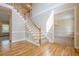 Hardwood entryway with staircase at 1611 Threepine Pl, Lilburn, GA 30047