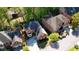 Aerial view of a brick home with a well-maintained lawn, mature landscaping, and a charming neighborhood setting at 2473 Kings Arms Dr, Atlanta, GA 30345