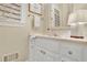 Well-lit bathroom featuring a white vanity with storage space at 2473 Kings Arms Dr, Atlanta, GA 30345