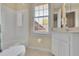 Clean bathroom featuring a combined tub and shower and white vanity at 2473 Kings Arms Dr, Atlanta, GA 30345