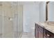 Updated bathroom with glass shower, granite vanity, and modern fixtures at 2473 Kings Arms Dr, Atlanta, GA 30345