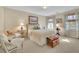 Bright bedroom with a comfortable bed, natural light, and neutral decor at 2473 Kings Arms Dr, Atlanta, GA 30345