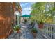 Relax on the large deck with plenty of seating among potted plants and trees at 2473 Kings Arms Dr, Atlanta, GA 30345