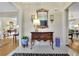 Welcoming foyer with hardwood floors, a decorative table, and elegant decor at 2473 Kings Arms Dr, Atlanta, GA 30345