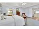 This light and bright main bedroom has an attached bathroom and bonus room access at 2473 Kings Arms Dr, Atlanta, GA 30345