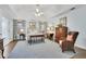 The main bedroom features trey ceilings, a ceiling fan, and windows with designer drapes at 2473 Kings Arms Dr, Atlanta, GA 30345