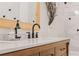 Bathroom vanity featuring double sinks, a modern faucet, and minimalist accessories at 521 Smithstone Se Rd, Marietta, GA 30067