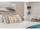 Bright bedroom featuring a serene color palette, and functional workspace near the bed at 521 Smithstone Se Rd, Marietta, GA 30067
