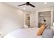 Bedroom featuring a bed, closet, wood-look flooring, and ensuite bathroom with a granite vanity at 521 Smithstone Se Rd, Marietta, GA 30067