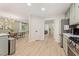 Open concept with bright updated kitchen, dining and living area with open sight lines throughout at 521 Smithstone Se Rd, Marietta, GA 30067