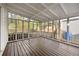 Cozy screened porch with wood floors offering views of the backyard at 1612 Alder Se Ct, Atlanta, GA 30317