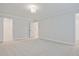 Spacious carpeted bedroom with ample natural light and neutral paint, creating a serene and inviting atmosphere at 170 Bluffington Way, Marietta, GA 30066
