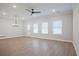 Bright living room with hardwood floors, recessed lighting, and an outdoor patio at 170 Bluffington Way, Marietta, GA 30066