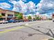 Charming downtown street view, featuring street parking and local businesses, under a bright sky at 170 Bluffington Way, Marietta, GA 30066