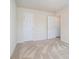 Bedroom with neutral carpet and a closet at 2206 Palomino Ln, Conyers, GA 30012
