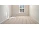 Bright bedroom featuring neutral walls and carpet at 2206 Palomino Ln, Conyers, GA 30012