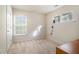 Bright bedroom with neutral carpet, light walls, and windows providing natural light at 2206 Palomino Ln, Conyers, GA 30012
