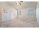 Bedroom with neutral walls and carpet, and two large windows for natural light at 2206 Palomino Ln, Conyers, GA 30012
