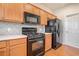 Well-equipped kitchen featuring stainless steel appliances and ample cabinet space at 2206 Palomino Ln, Conyers, GA 30012