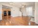 Bright living room with hardwood floors, fireplace, view to kitchen and front entry at 2206 Palomino Ln, Conyers, GA 30012