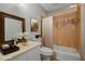 Bathroom featuring a vanity, mirror, toilet, and bathtub at 4128 Mayflower Sw Ct, Lilburn, GA 30047
