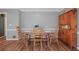 Cozy dining room showcasing a wooden table set, adding warmth and functionality to the home at 4128 Mayflower Sw Ct, Lilburn, GA 30047