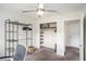 Bright bedroom featuring a closet with shelving and clothing rack storage for versatile organization at 1548 Highway 81 W, Mcdonough, GA 30253