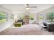 Spacious living room with natural light, two ceiling fans and ample space at 1548 Highway 81 W, Mcdonough, GA 30253