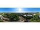 Panoramic aerial view of an extensive community surrounded by lush trees, showcasing a serene residential environment at 158 Bluffington Way, Marietta, GA 30066