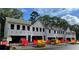 New construction townhomes showing the exterior before completion and open garages at 158 Bluffington Way, Marietta, GA 30066