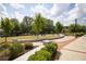 This is an inviting park with landscaped flower beds, walking paths and mature trees at 1800 Jordan Brook Dr, Lawrenceville, GA 30043