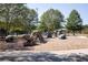 The park's playground showcases interactive dinosaur climbing structures at 1800 Jordan Brook Dr, Lawrenceville, GA 30043