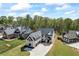 Stunning new construction home featuring a three-car garage and a brick and siding exterior at 407 Thunder Rd, Buford, GA 30518