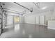 Spacious three-car garage with ample room for storage and organization at 407 Thunder Rd, Buford, GA 30518