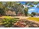 Scenic town square with brick walkways, lush green spaces, and historic buildings on a sunny day at 407 Thunder Rd, Buford, GA 30518