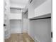 Well-organized walk-in closet with built-in shelving and modern design at 407 Thunder Rd, Buford, GA 30518