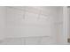 Walk-in closet featuring wire shelving for easy storage and organization at 1227 Cushenberry Ln, Atlanta, GA 30318