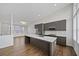 Kitchen boasts an island, stainless appliances, and modern finishes at 1227 Cushenberry Ln, Atlanta, GA 30318