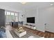 Open living space with hardwood floors and lots of natural light at 1227 Cushenberry Ln, Atlanta, GA 30318